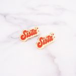 lot de 2 pin's sista typo retro funky couleur corail