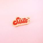 pin's sista doré et orange